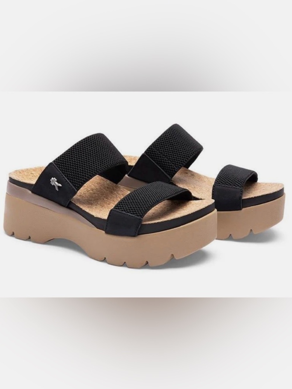 KURU Loma Tila Cork Footbed Orthotic Sandals in a Classic Slip-on Styling.